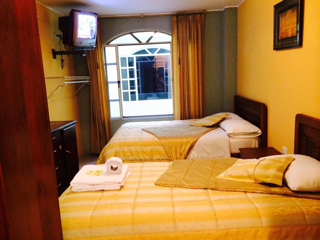Hostal Grand Rio Баньос Номер фото